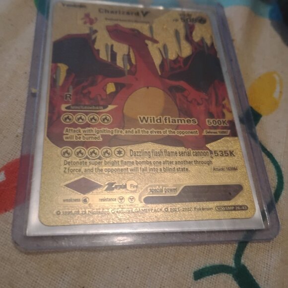 I'm selling these pokemon cards (golden Charizard V Gengar&mimikyu GX tag team) - Picture 4 of 4